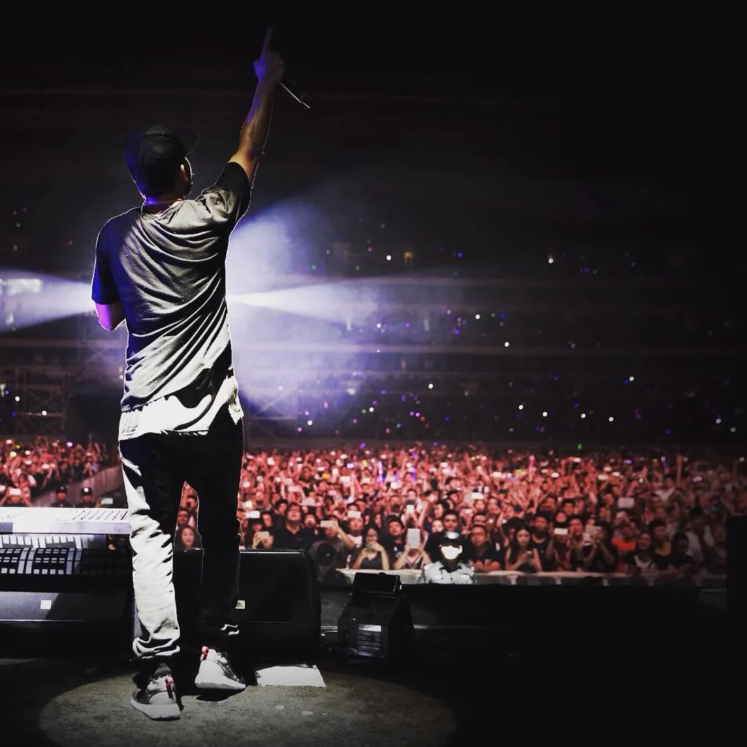 Mike Shinoda on a stage